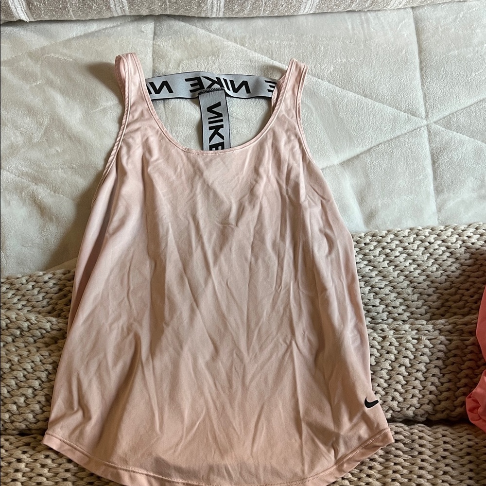 Nike Women's light orange Tank Top